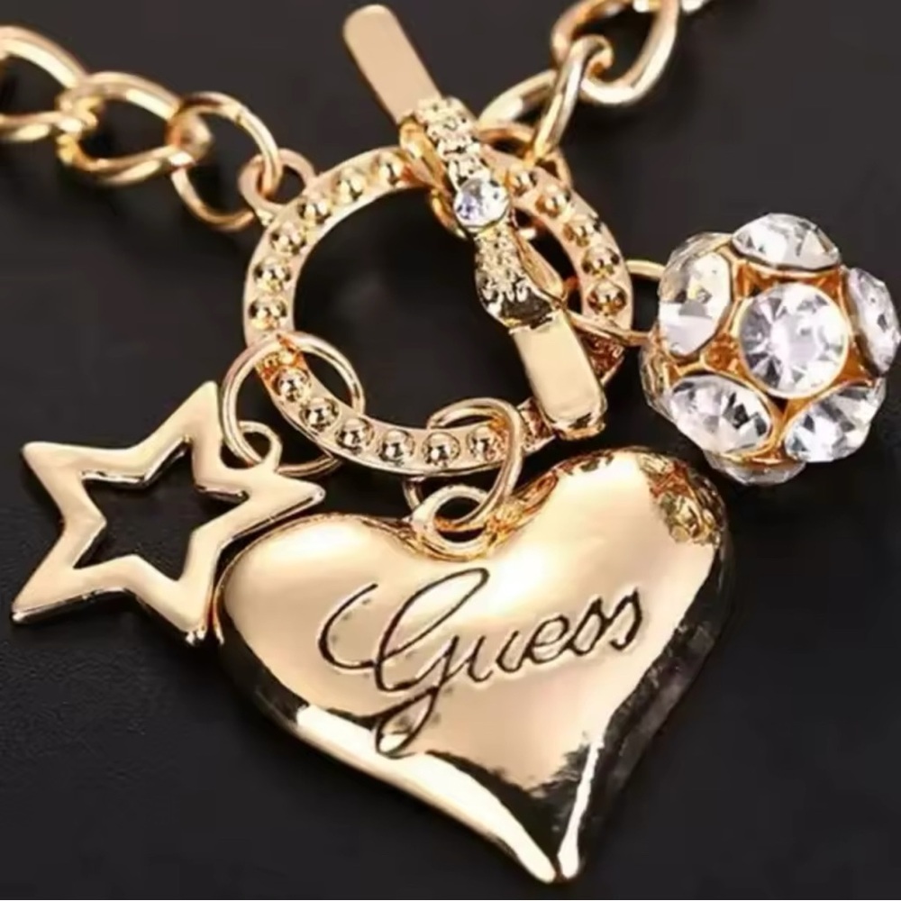 Guess Charm Bracelet gold Heart & Star Accents Toggle Closure